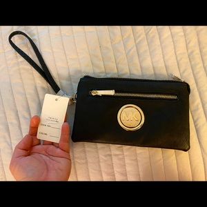 MK wristlet black. New w/tag.